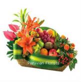Más información de Arreglo Tropical: canasta de frutas  con flores
